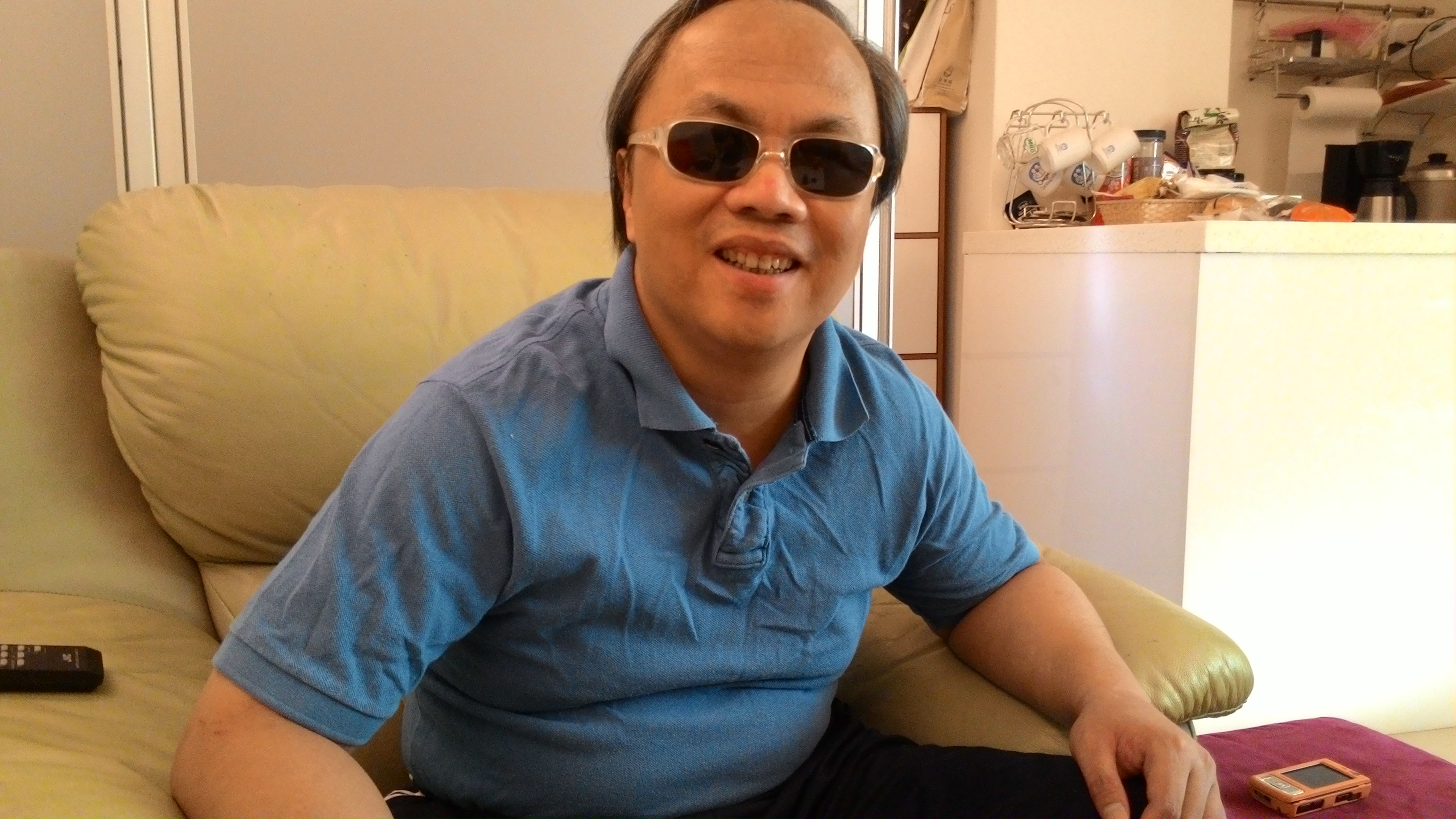 王忠義是少數視障者創業成功的楷模。